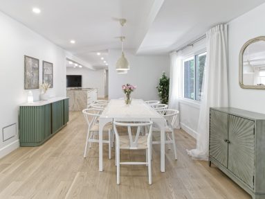 Bright and airy living room and kitchen island with hardwood floors in Ottawa captured by Brandplayers.