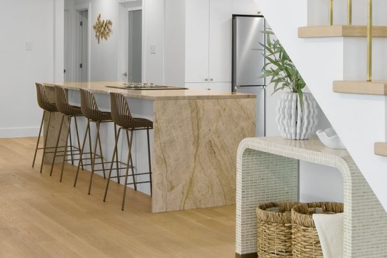 Bright and airy foyer open space leading to kitchen with hardwood floors in Ottawa captured by Brandplayers.